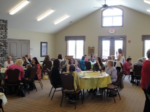 A group of people sitting around a table.